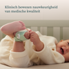 Baby met de Owlet Dream Sock aan de voet